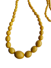 Load image into Gallery viewer, 1930s Mustard Long Galalith Necklace
