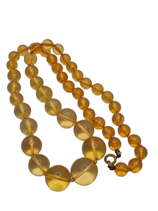1950s Long Peach Knotted Lucite Necklace