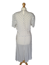 Load image into Gallery viewer, 1940s Blue and White Polka Dot Peplum Dress
