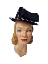 Load image into Gallery viewer, 1940s Navy Blue Felt Tilt Hat With RAF Symbol Print and Huge Bow
