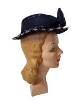 Load image into Gallery viewer, 1940s Navy Blue Felt Tilt Hat With RAF Symbol Print and Huge Bow
