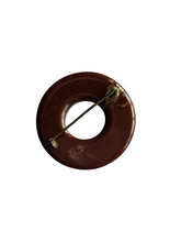 Load image into Gallery viewer, 1940s Carved Brown Bakelite Circle Brooch
