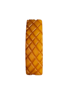 1940s Butterscotch Carved Bakelite Curved Dress Clip