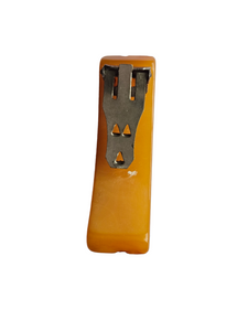 1940s Butterscotch Carved Bakelite Curved Dress Clip