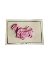 Load image into Gallery viewer, 1940s Deadstock Pink Celluloid Dog Brooch
