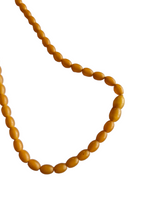Load image into Gallery viewer, 1940s Dark Orange Olive Bead Galalith Necklace
