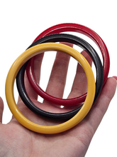 Load image into Gallery viewer, 1940s Red, Yellow and Black Bakelite Bangle Set
