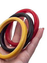 Load image into Gallery viewer, 1940s Red, Yellow and Black Bakelite Bangle Set
