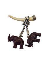 Load image into Gallery viewer, 1940s Carved Brown Elephant Dangly Brooch
