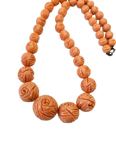 Load image into Gallery viewer, 1940s Carved Coral Pink Galalith Necklace

