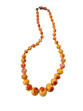 Load image into Gallery viewer, 1930s Orange and Red Speckled Glass Necklace
