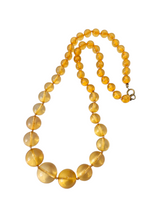 Load image into Gallery viewer, 1950s Long Peach Knotted Lucite Necklace
