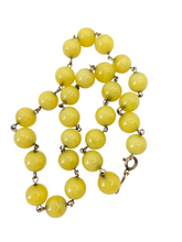 Load image into Gallery viewer, 1930s Yellow Glass Rolled Wite Necklace
