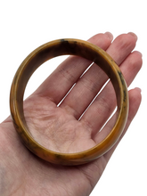 Load image into Gallery viewer, 1940s Mustard and Dark Green Marbled Egg Shape Bakelite Bangle
