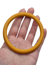 Load image into Gallery viewer, 1940s Golden Yellow Bakelite Bangle

