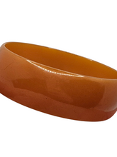 Load image into Gallery viewer, 1940s Huge Thin Orange Bakelite Bangle
