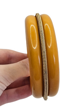 Load image into Gallery viewer, 1940s MEGA Egg Yolk Bakelite and Metal Bangle
