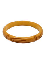 Load image into Gallery viewer, 1940s Egg Yolk Carved Bakelite Bangle
