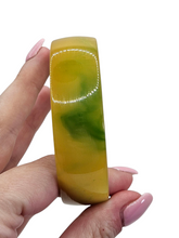 Load image into Gallery viewer, 1940s Bright Yellow and Green Marbled Thin Bakelite Bangle
