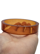 Load image into Gallery viewer, 1940s Sheer Iced Tea Flat Cut Bakelite Bangle
