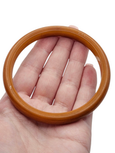 Load image into Gallery viewer, 1940s Dark Orange Bakelite Bangle
