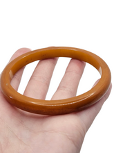 Load image into Gallery viewer, 1940s Dark Orange Bakelite Bangle
