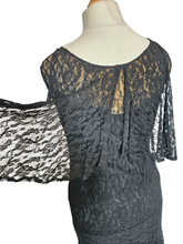 Load image into Gallery viewer, 1920s Black Lace Dipped Hem Dress With Faux Cape
