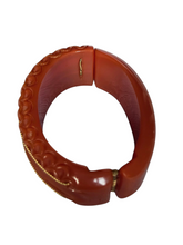 Load image into Gallery viewer, 1940s Dark Caramel Carved Bakelite Clamper
