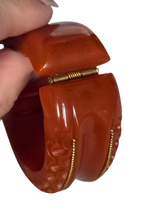 Load image into Gallery viewer, 1940s Dark Caramel Carved Bakelite Clamper
