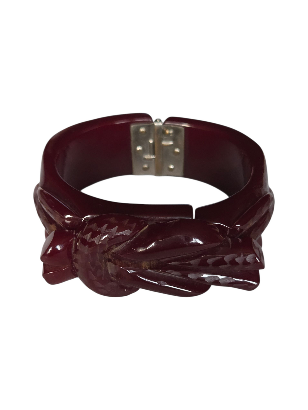 1940s Burgundy Carved Bakelite Knot Clamper
