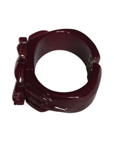 Load image into Gallery viewer, 1940s Burgundy Carved Bakelite Knot Clamper
