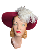 Load image into Gallery viewer, 1940s Dark Raspberry Red Felt Halo Hat With Huge Ostrich Feather

