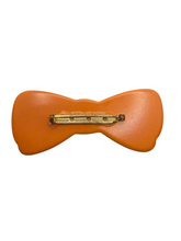 Load image into Gallery viewer, 1940s Huge Orange Bakelite Bow Brooch
