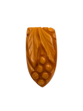 Load image into Gallery viewer, 1940s Chunky Orange Bakelite Grapes Dress Clip
