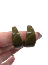 Load image into Gallery viewer, 1940s Dark Green Carved Bakelite Hoop Earrings
