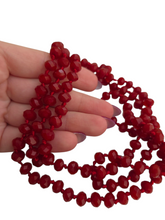 Load image into Gallery viewer, 1930s Red Faceted Glass Knotted Necklace
