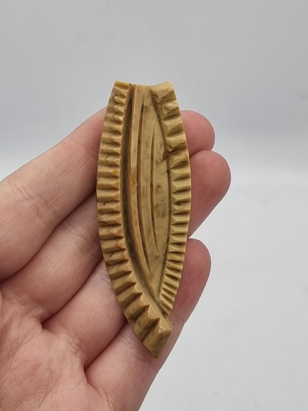 1930s Carved Galalith Stone/Beige Dress Clip