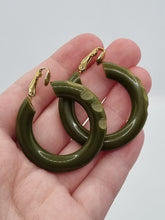 Load image into Gallery viewer, 1940s Carved Bakelite Moss Green Earrings
