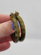 Load image into Gallery viewer, 1940s Carved Bakelite Moss Green Earrings
