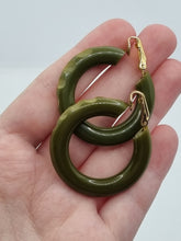 Load image into Gallery viewer, 1940s Carved Bakelite Moss Green Earrings
