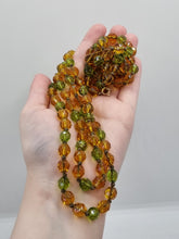 Load image into Gallery viewer, 1930s Deco Orange and Green Glass Long Knotted Necklace
