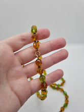 Load image into Gallery viewer, 1930s Deco Orange and Green Glass Long Knotted Necklace
