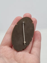 Load image into Gallery viewer, 1940s Chocolate Brown Carved Bakelite Brooch
