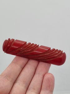 1940s Carved Red Bakelite Bar Brooch