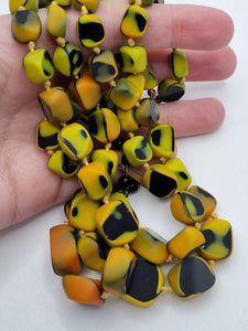 1950s Black, Yellow and Orange Marbled Knotted Glass Necklace