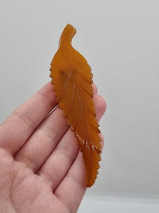 1930s HUGE Butterscotch Carved Bakelite Curved Leaf Dress Clip