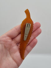 Load image into Gallery viewer, 1930s HUGE Butterscotch Carved Bakelite Curved Leaf Dress Clip

