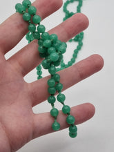 Load image into Gallery viewer, 1920s Faux Jade Green Glass Knotted Flapper Necklace
