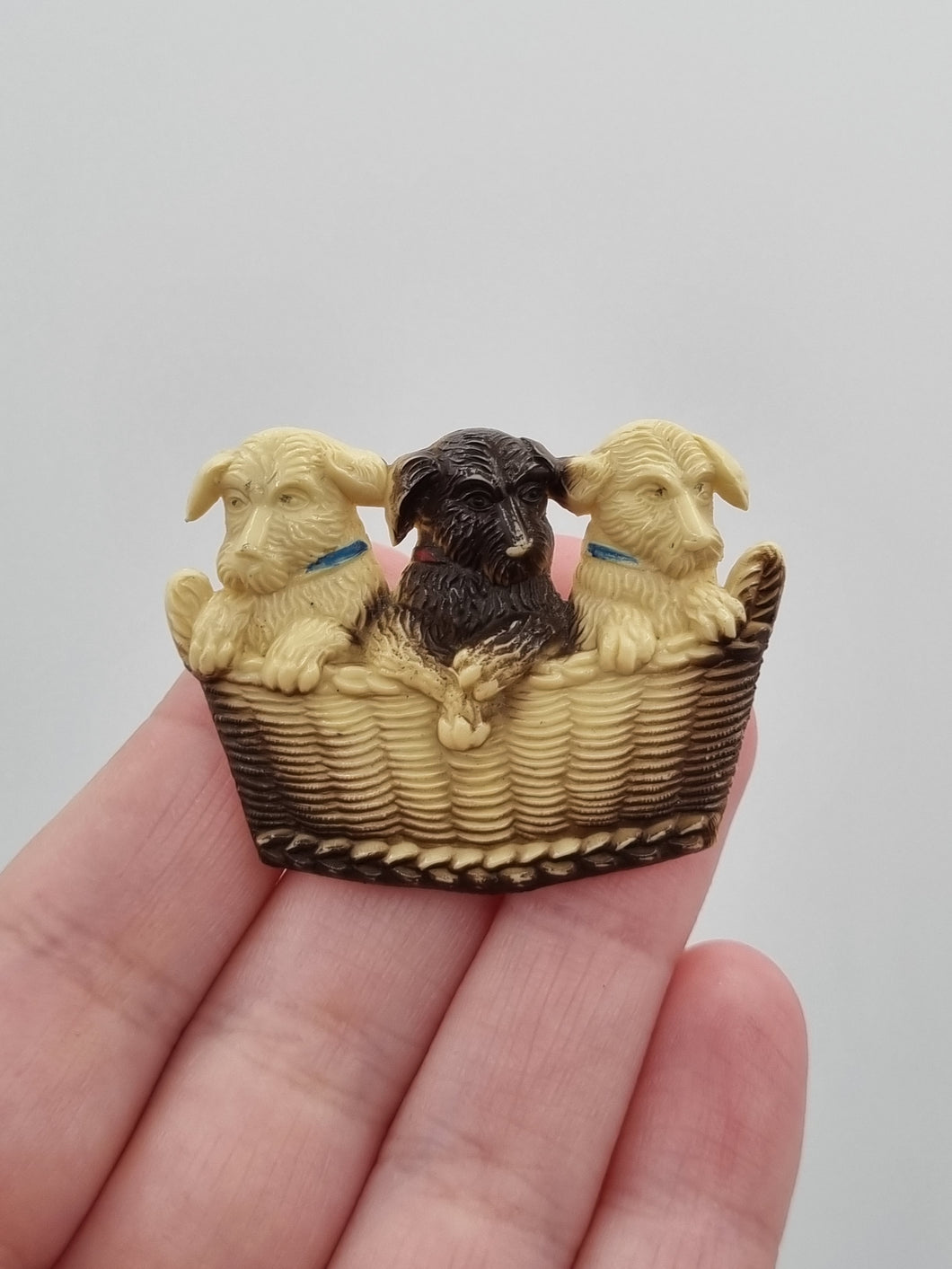 1940s Celluloid Dogs in a Basket Brooch