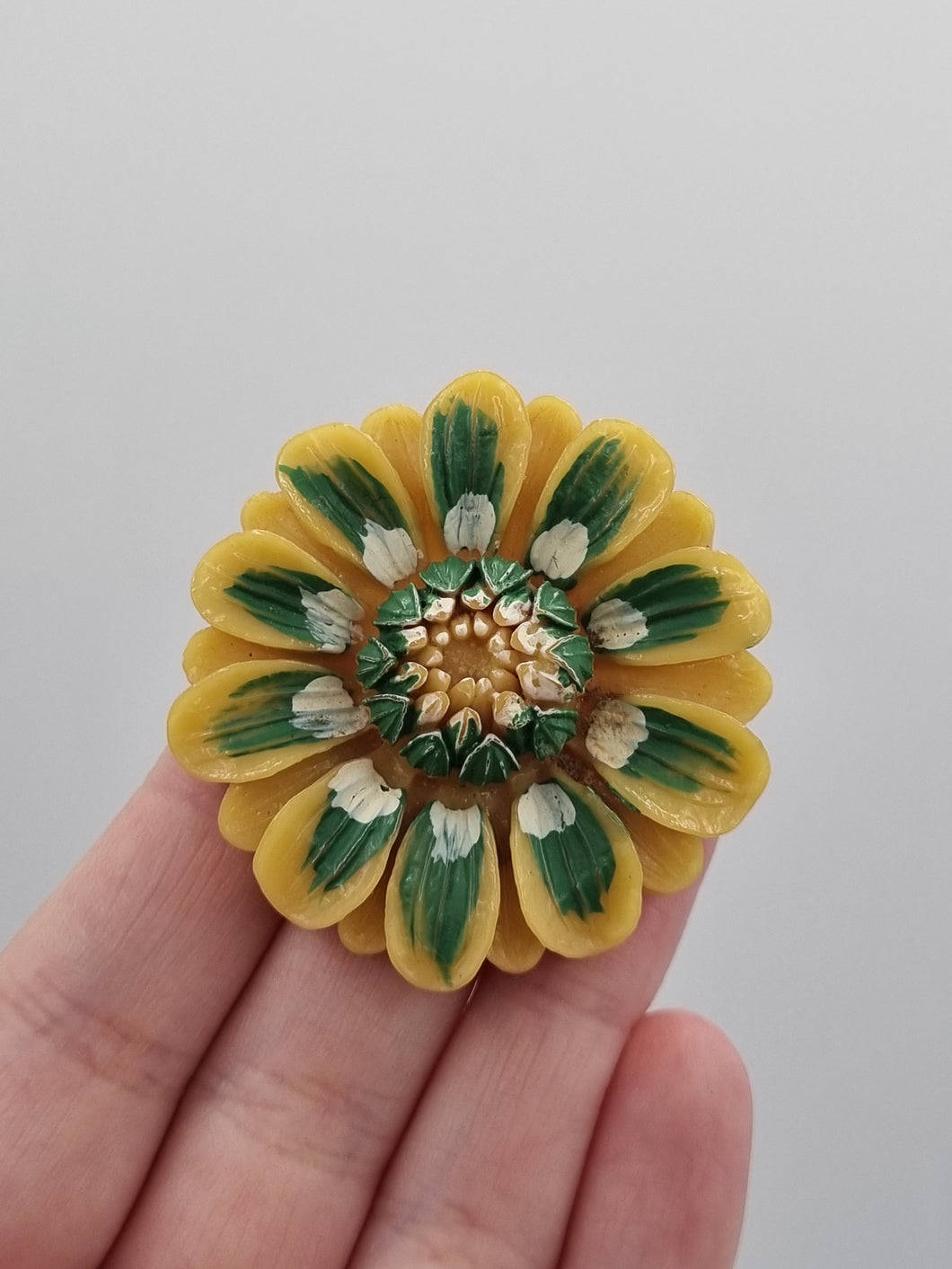 1940s Painted Green and Yellow Celluloid Flower Brooch